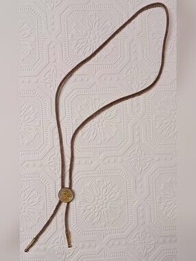 Gold Tone Mexican Medallion Bolo Tie With Suede Cord